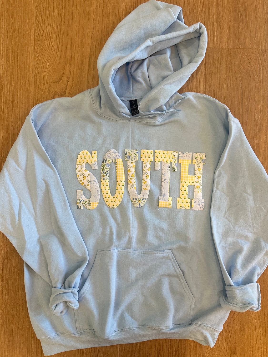 YELLOW + BLUE PATCHWORK SOUTH  - LIGHT BLUE HOODIE