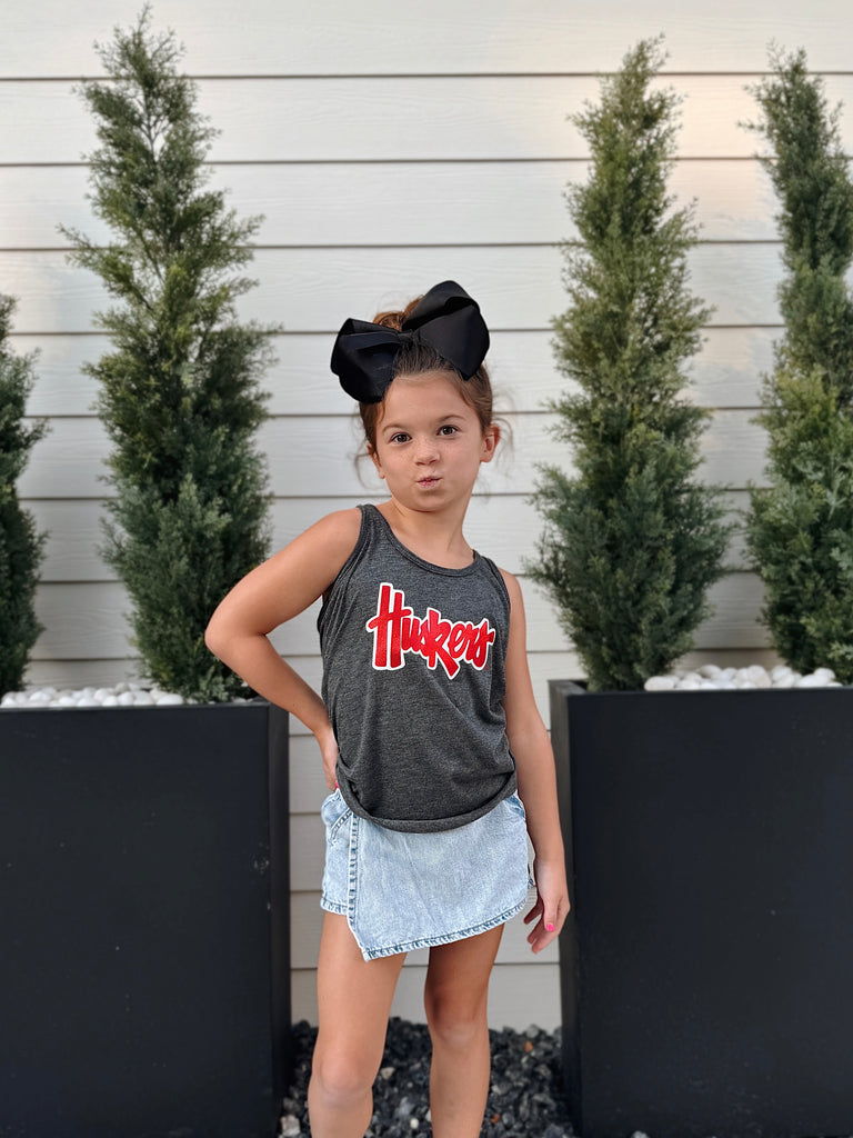 RED METALLIC/WHITE HUSKERS SCRIPT - YOUTH DARK GREY RAZORBACK TANK