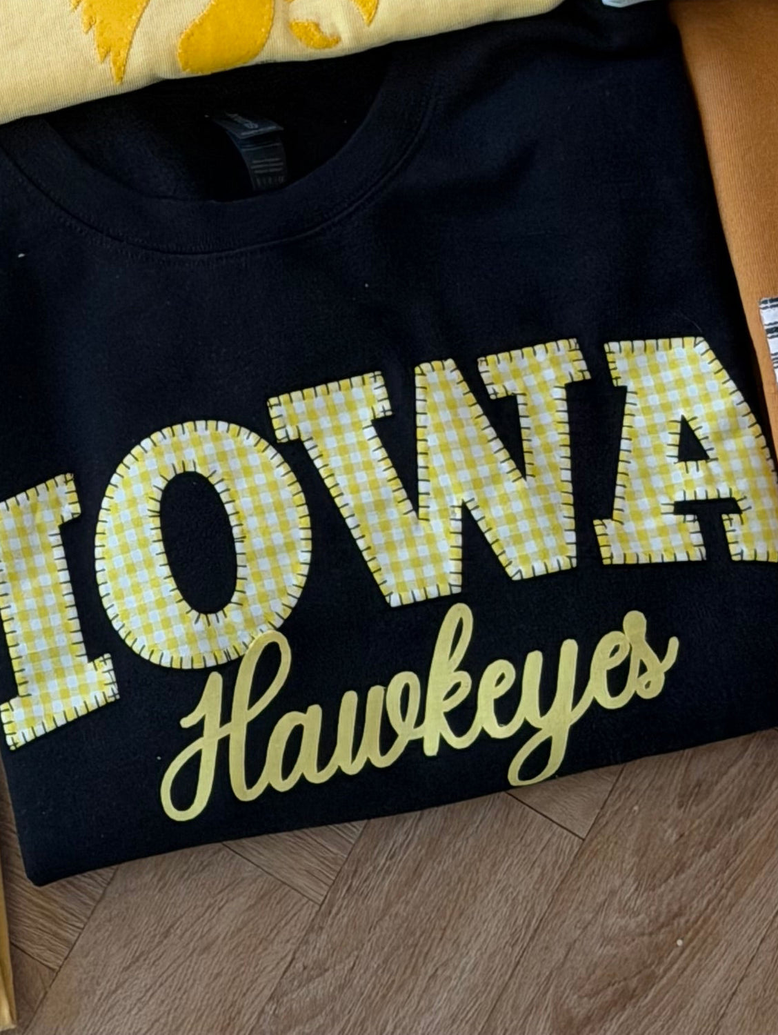 YELLOW GINGHAM IOWA EMBROIDERED HAWKEYES - BLACK CREWNECK