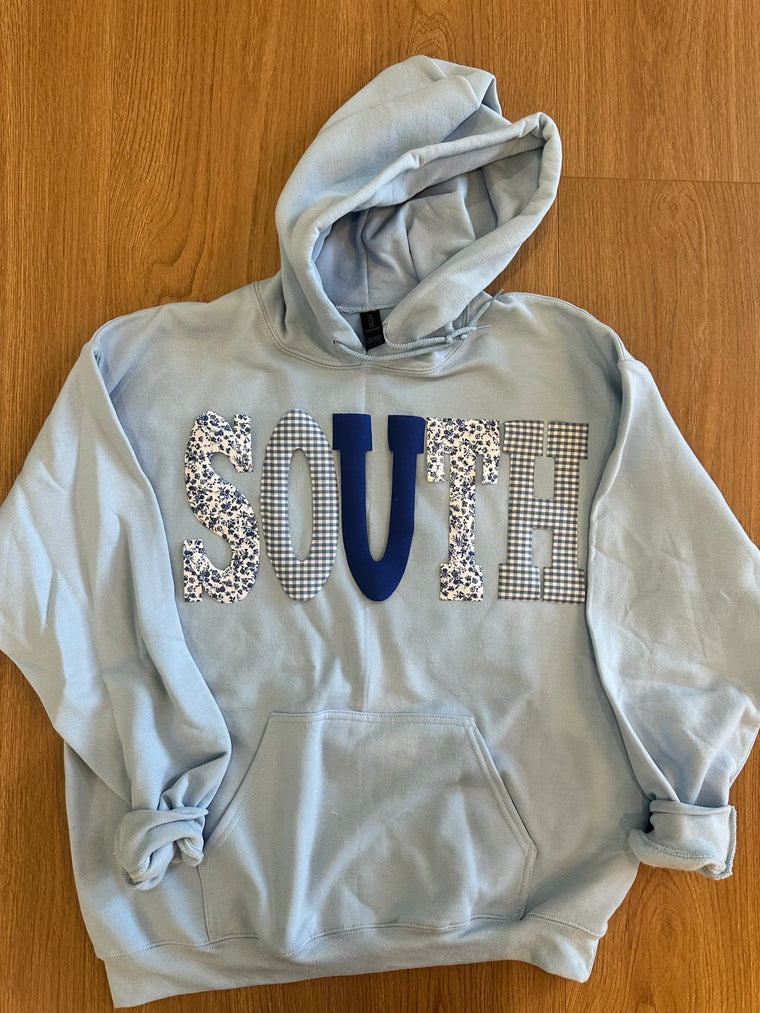 PATCHWORK SOUTH  - LIGHT BLUE HOODIE