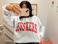 VARSITY RED DAINTY FLORAL HUSKERS - ASH GREY CREWNECK (YOUTH + ADULT)