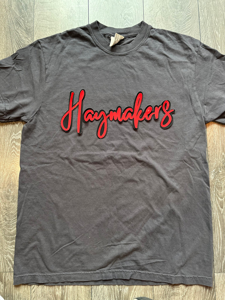 RED/BLACK CURSIVE HAYMAKERS - GREY COMFORT COLORS TEE (YOUTH + ADULT)