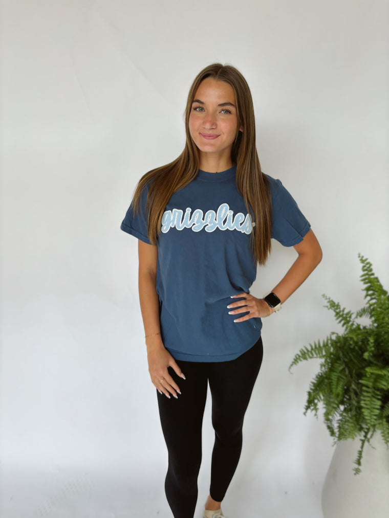 CURSIVE LIGHT BLUE/WHITE SPARKLE GRIZZLIES - NAVY TEE