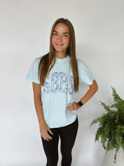 VARSITY BLUE FLORAL SBHS - LIGHT BLUE TEE