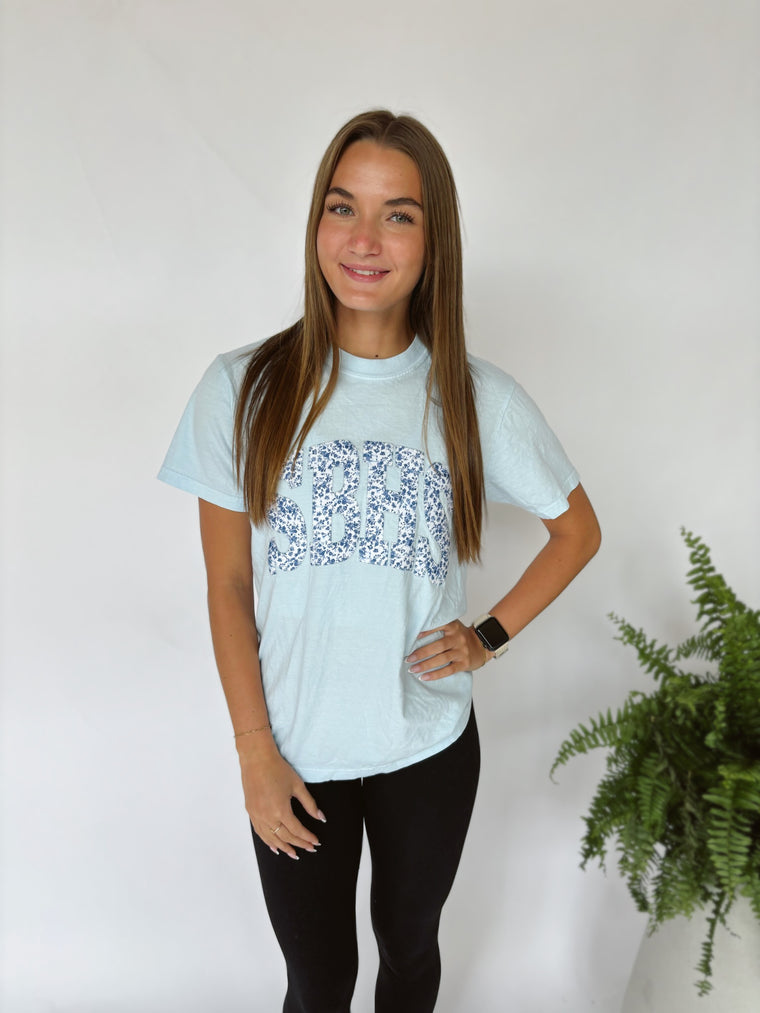 VARSITY BLUE FLORAL SBHS - LIGHT BLUE TEE