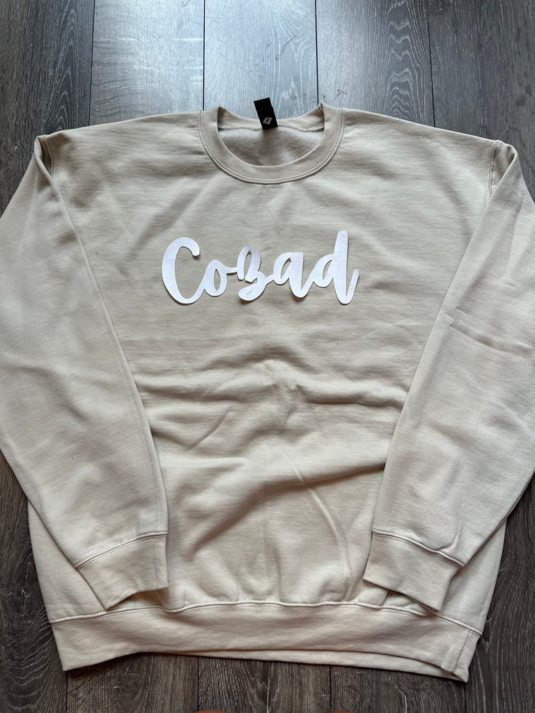 CURSIVE WHITE SPARKLE COZAD - SAND GILDAN CREWNECK