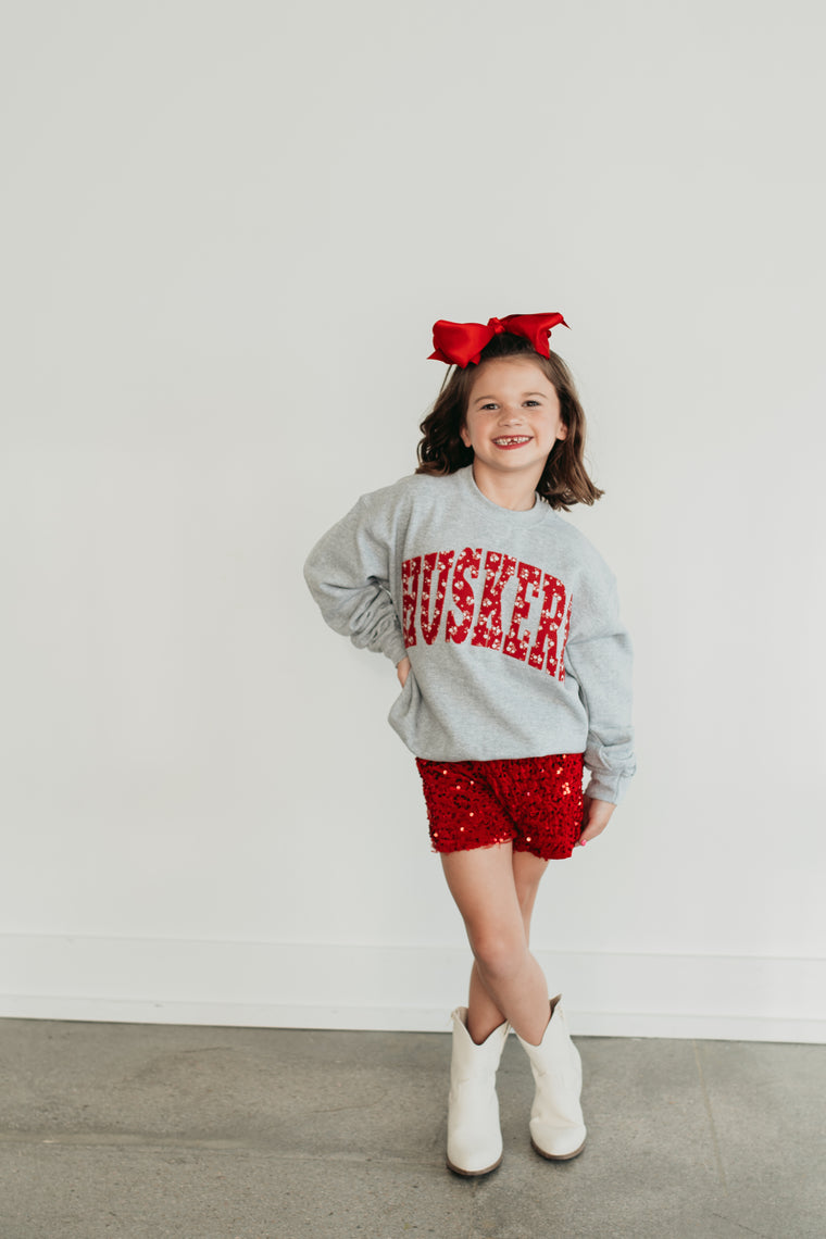VARSITY RED DAINTY FLORAL HUSKERS - ASH GREY CREWNECK (YOUTH + ADULT)