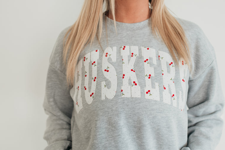 VARSITY CHERRY HUSKERS - GREY CROP CREW