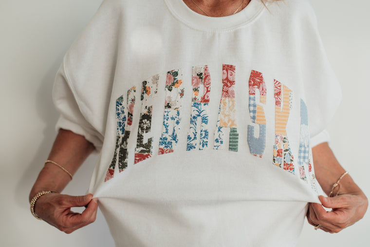VARSITY MULTICOLOR PATTERNED NEBRASKA - WHITE CREWNECK