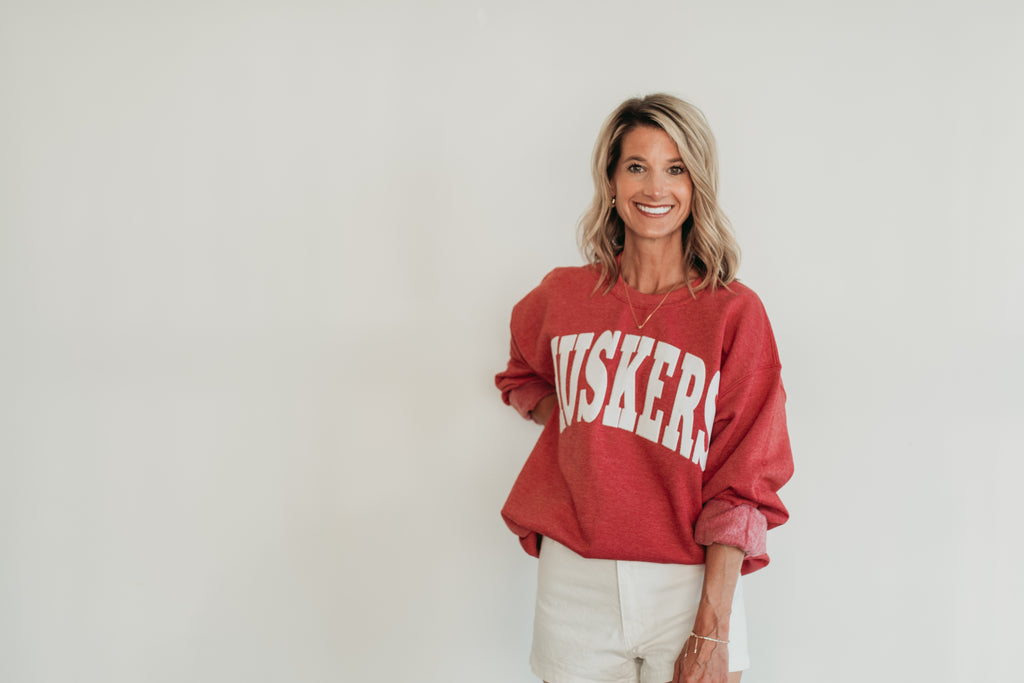 VARSITY WHITE HUSKERS - SCARLET RED CREWNECK