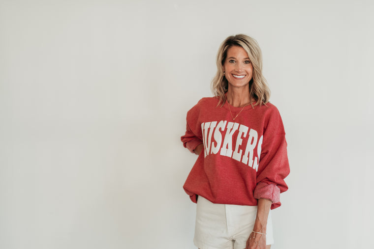 VARSITY WHITE HUSKERS - SCARLET RED CREWNECK