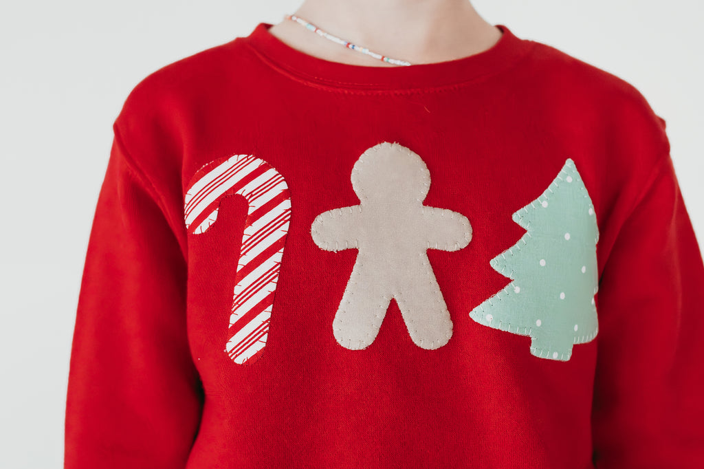 HOLIDAY SYMBOLS - RED CREWNECK (TODDLER + YOUTH + ADULT)