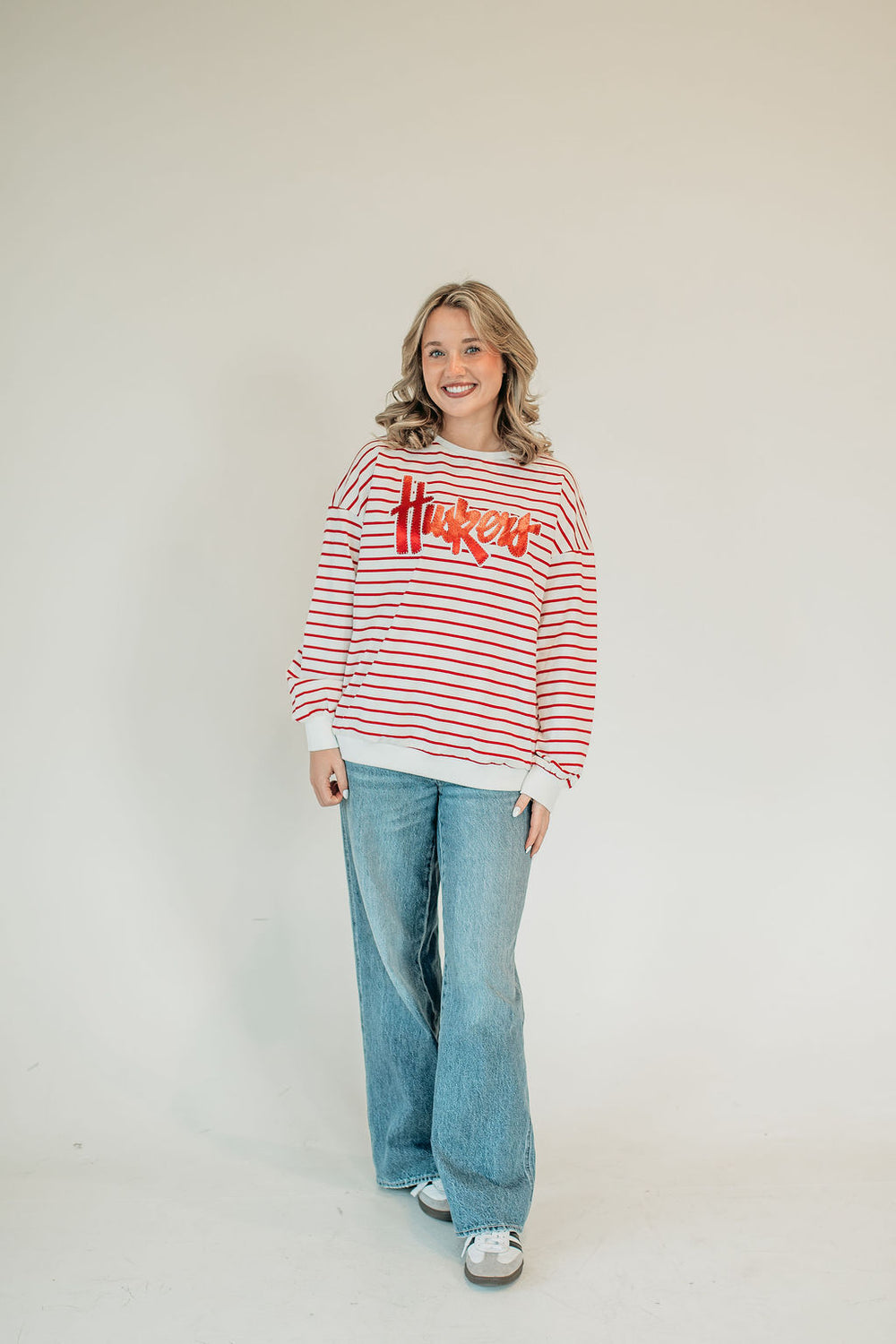 RED METALLIC/WHITE HUSKERS SCRIPT - RED STRIPED CREWNECK