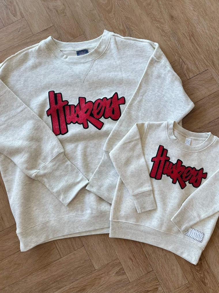 HUSKERS - OATMEAL SUEDED CREWNECK (TODDLER + YOUTH + ADULT)