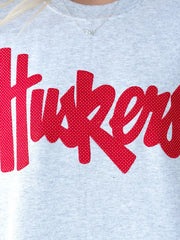 RED POLKA DOT HUSKERS SCRIPT - ASH CREWNECK