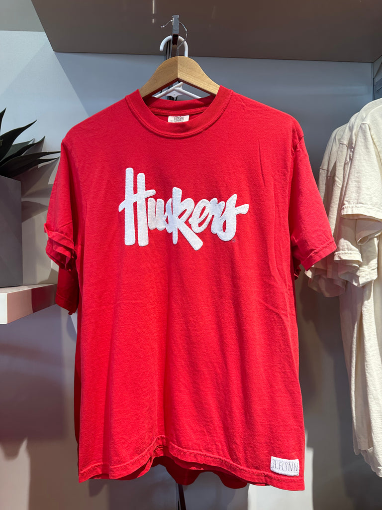 WHITE HUSKERS SCRIPT - RED TEE **