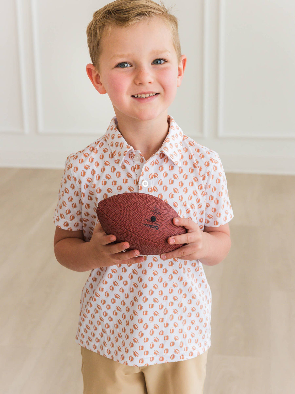 RuffleButts + RuggedButts - Boys Football Frenzy Knit Short Sleeve Performance Polo: White / 2T