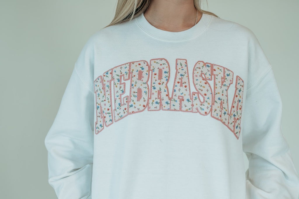 NEBRASKA (wildflower + light pink backing) - WHITE CREWNECK