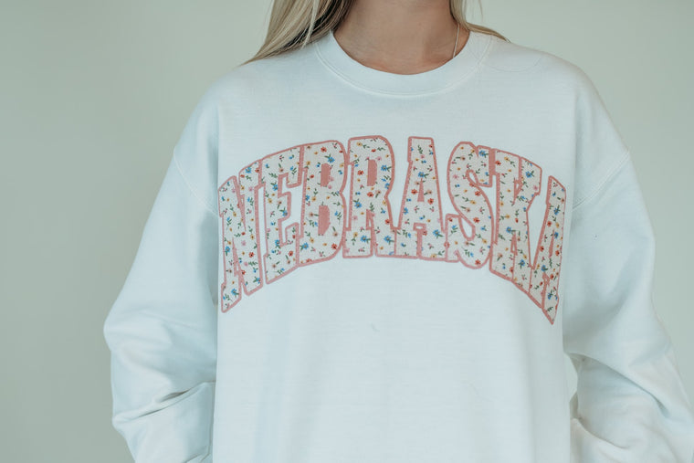 NEBRASKA (wildflower + light pink backing) - WHITE CREWNECK