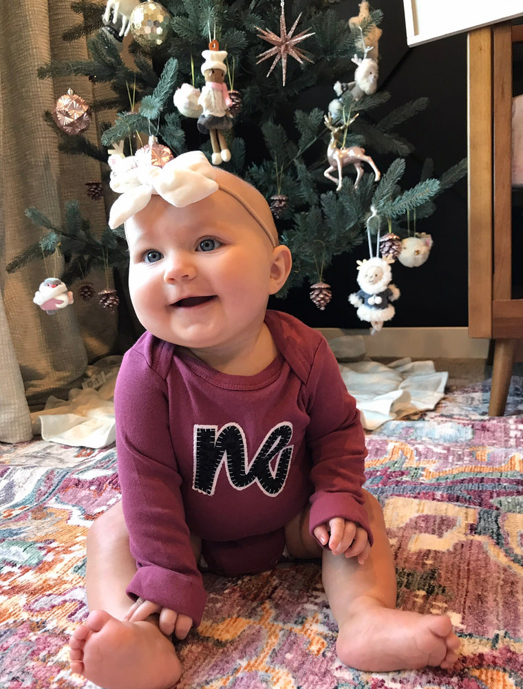 PLUM ONESIE WITH BLACK CHEETAH NE