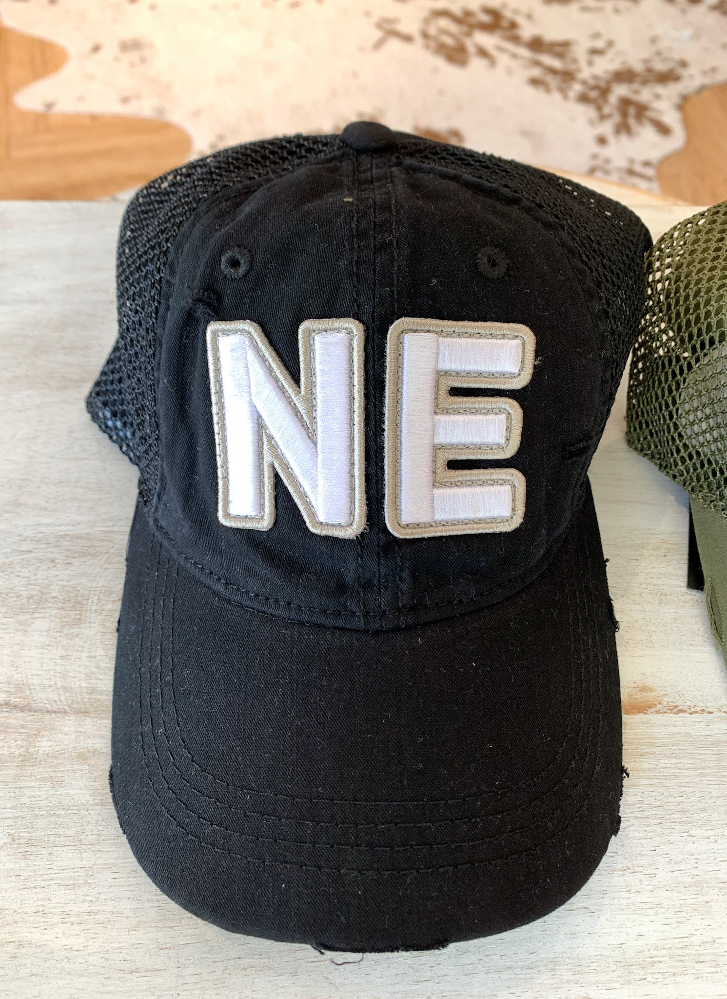 NE EMBROIDERED TRUCKER HAT – H.FLYNN