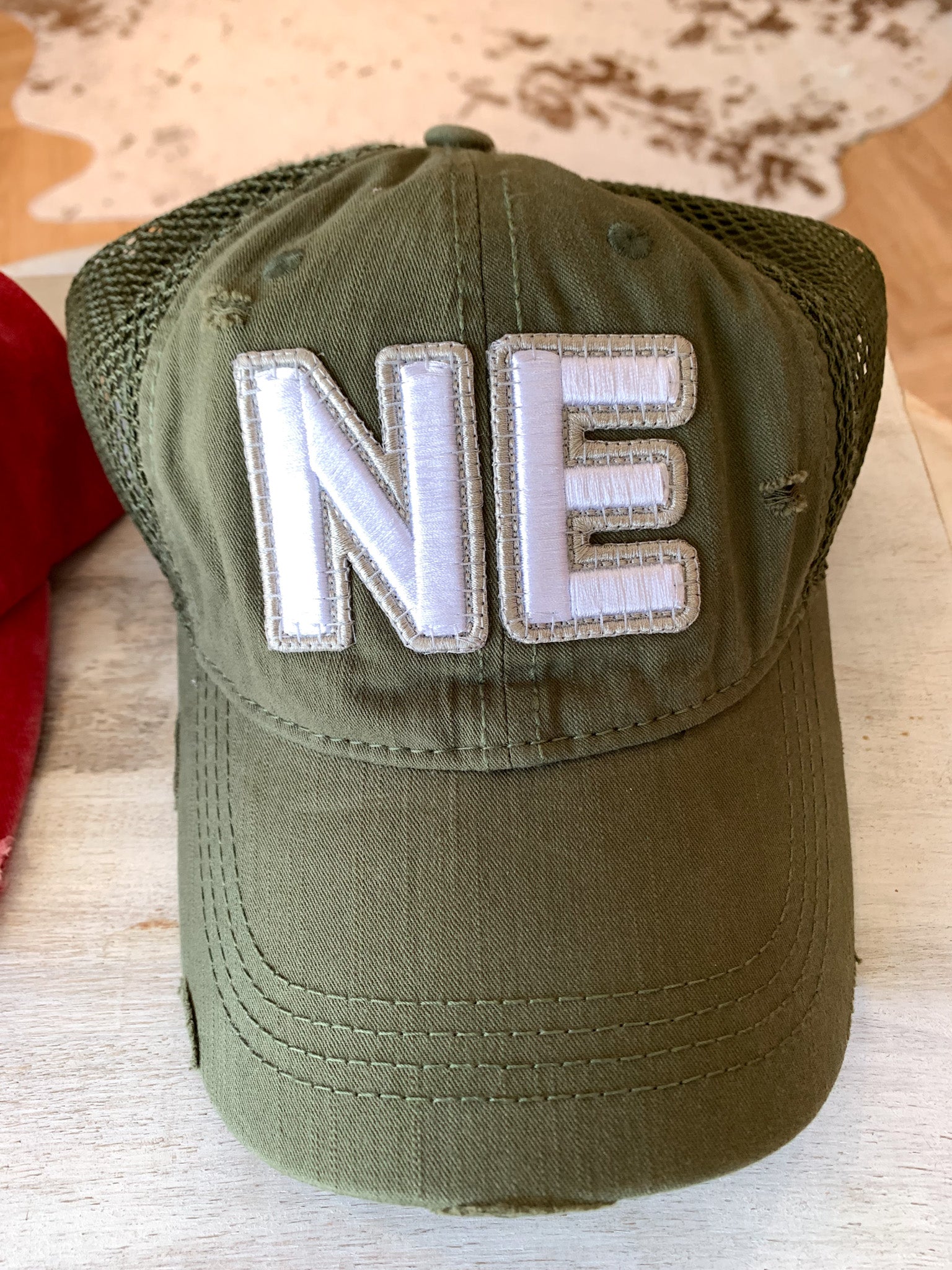 NE EMBROIDERED TRUCKER HAT – H.FLYNN